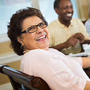 elderly woman enjoying independent living at The Delaney at Lake Waco