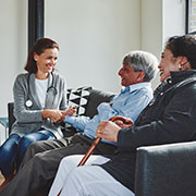 consultation about senior living with elderly couple at The Delaney at Lake Waco - small size