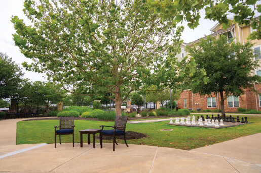 outdoor area with chairs and chess